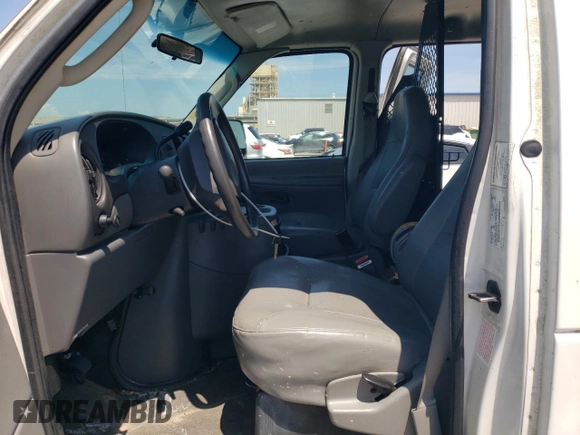 2004 Ford Econoline Cargo with VIN 1FTRE14W04HA41300, listed as a Copart auction lot 64768745 with 169,865 mi miles and Clean title. Bid and sale history available at DreamBid. Image 7.