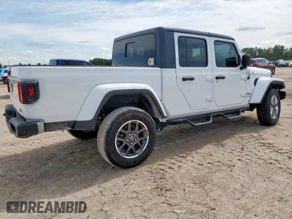 2023 Jeep Gladiator Overland z VIN 1C6HJTFG0PL514615, wystawiony jako Copart lot #57795945 z przebiegiem 32 427 mil mil oraz Czysty tytuł • Clean title. Historia ofert i sprzedaży dostępna na DreamBid. Obrazek 3.