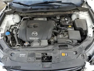 2016 Mazda CX-5 Touring with VIN JM3KE4CY5G0908092, listed as a Copart auction lot 49504015 with 126,825 mi miles and Salvage Title. Bid and sale history available at carsss.com. Image 12.