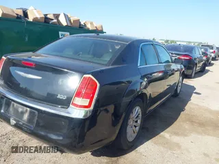 2013 Chrysler 300 with VIN 2C3CCAAGXDH743261, listed as a IAAI auction lot 41982698 with 148,107 mi miles. Bid and sale history available at carsss.com. Image 4.