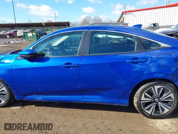 2017 Honda Civic EX-T with VIN 19XFC1E33HE028257, listed as a IAAI auction lot 41395356 with 51,154 mi miles and . Bid and sale history available at DreamBid. Image 14.