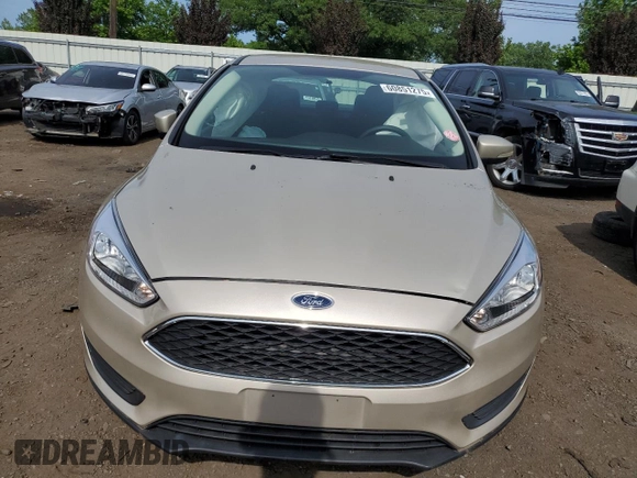 2017 Ford Focus SE z VIN 1FADP3F24HL291870, wystawiony jako Copart lot #60851275 z przebiegiem 83 334 mil mil oraz Szkoda całkowita • Salvage title. Historia ofert i sprzedaży dostępna na DreamBid. Obrazek 5.