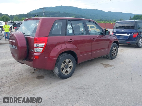 2008 Suzuki Grand Vitara w/Spare & Cargo Covers z VIN JS3TD941784101146, wystawiony jako IAAI lot #42546416 z przebiegiem 83 064 mil mil oraz . Historia ofert i sprzedaży dostępna na DreamBid. Obrazek 4.
