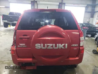 2011 Suzuki Grand Vitara Premium with VIN JS3TD0D25B4102081, listed as a Copart auction lot 43978955 with 310,535 mi miles and Salvage title. Bid and sale history available at DreamBid. Image 6.