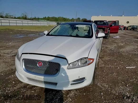 2014 Jaguar XJ Portfolio with VIN SAJWA2GZ3E8V60788, listed as a Copart auction lot 43272405 with 97,196 mi miles and Salvage title. Bid and sale history available at DreamBid. Image 10.