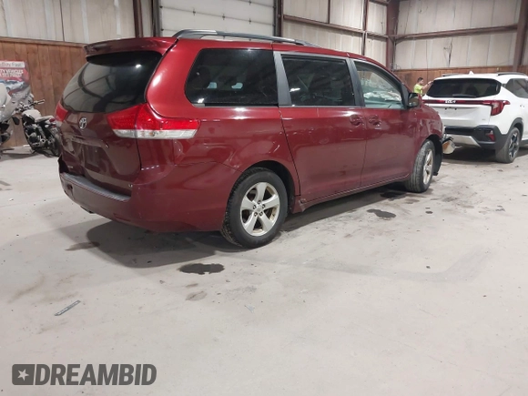 2013 Toyota Sienna LE AAS with VIN 5TDKK3DC6DS298372, listed as a IAAI auction lot 42062376 with 313,697 mi miles. Bid and sale history available at carsss.com. Image 4.