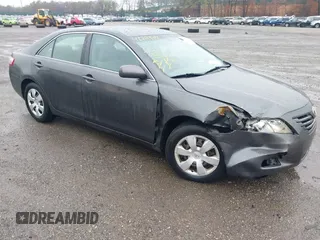 2007 Toyota Camry CE with VIN 4T1BE46K77U688152, listed as a IAAI auction lot 41799406 with 152,033 mi miles. Bid and sale history available at carsss.com. Image 1.