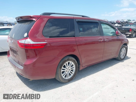 2016 Toyota Sienna XLE with VIN 5TDYK3DC7GS716470, listed as a IAAI auction lot 42177176 with 121,165 mi miles and . Bid and sale history available at DreamBid. Image 4.