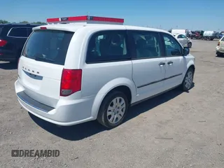 2015 Dodge Grand Caravan American Value with VIN 2C4RDGBG1FR748088, listed as a IAAI auction lot 42052160 with 248,540 mi miles and . Bid and sale history available at DreamBid. Image 4.