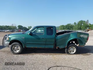 1999 Ford F-150 with VIN 1FTRX18W4XNA50527, listed as a IAAI auction lot 42563746 with 213,959 mi miles and . Bid and sale history available at DreamBid. Image 15.
