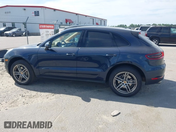 2015 Porsche Macan S with VIN WP1AB2A55FLB67075, listed as a IAAI auction lot 42068637 with 148,068 mi miles. Bid and sale history available at carsss.com. Image 14.