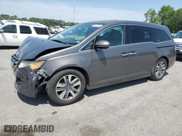 2014 Honda Odyssey Touring with VIN 5FNRL5H93EB061754, listed as a Copart auction lot 55182015 with 168,058 mi miles and Salvage title. Bid and sale history available at DreamBid. Image 1.