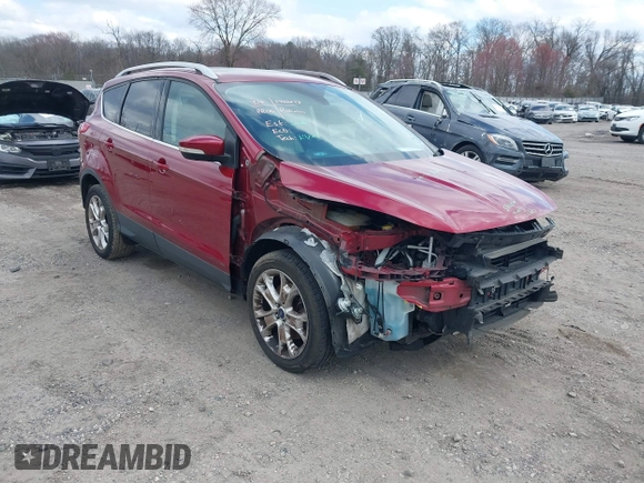 2016 Ford Escape Titanium with VIN 1FMCU9JX2GUA89716, listed as a IAAI auction lot 41899786 with 85,474 mi miles and . Bid and sale history available at DreamBid. Image 1.