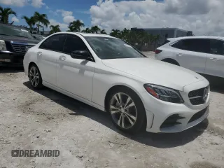 2019 Mercedes-Benz C 300 with VIN 55SWF8DB7KU295023, listed as a Copart auction lot 60521195 with 69,097 mi miles and Salvage title. Bid and sale history available at DreamBid. Image 4.