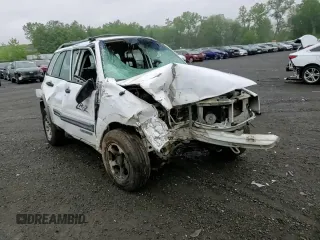 2002 Chevrolet Tracker ZR2 с VIN 2CNBJ734726925605, выставлен на аукционе Copart как лот 60070915 с пробегом Не указан миль и Списание • Salvage title. История ставок и продаж доступна на DreamBid. Изображение 13.
