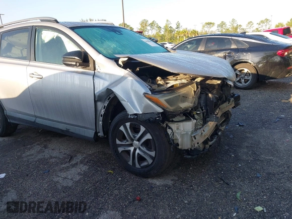 2017 Toyota RAV4 LE with VIN 2T3BFREV1HW607984, listed as a IAAI auction lot 41878970 with 136,941 mi miles and . Bid and sale history available at DreamBid. Image 18.