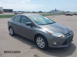 2012 Ford Focus SE with VIN 1FAHP3F21CL463413, listed as a IAAI auction lot 42564350 with 115,849 mi miles and . Bid and sale history available at DreamBid. Image 1.