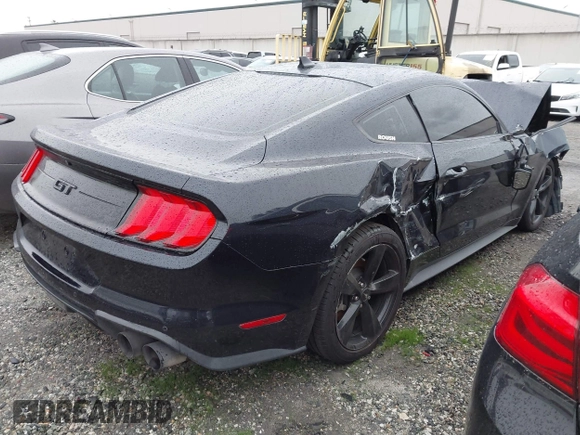 2021 Ford Mustang GT with VIN 1FA6P8CF4M5128552, listed as a IAAI auction lot 41455396 with 41,715 mi miles. Bid and sale history available at carsss.com. Image 4.