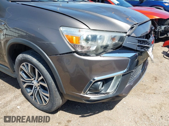 2018 Mitsubishi Outlander SEL z VIN JA4AP4AW4JU018385, wystawiony jako IAAI lot #41868875 z przebiegiem 83 910 mil mil oraz . Historia ofert i sprzedaży dostępna na DreamBid. Obrazek 18.