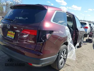 2016 Honda Pilot EX-L with VIN 5FNYF6H50GB061428, listed as a IAAI auction lot 41891865 with 149,390 mi miles. Bid and sale history available at carsss.com. Image 4.