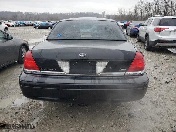 2011 Ford Crown Victoria LX with VIN 2FABP7EV5BX139357, listed as a Copart auction lot 84149834 with 144,385 mi miles and Salvage Title. Bid and sale history available at carsss.com. Image 6.