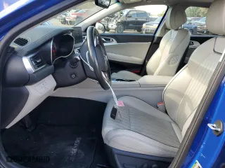 2020 Genesis G70 2.0T with VIN KMTG34LA5LU047721, listed as a Copart auction lot 74009343 with 34,676 mi miles. Bid and sale history available at carsss.com. Image 7.
