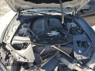 2015 BMW 6 Series 640i xDrive z VIN WBA6B8C53FD453909, wystawiony jako Copart lot #55292765 z przebiegiem 84 971 mil mil oraz Szkoda całkowita • Salvage title. Historia ofert i sprzedaży dostępna na DreamBid. Obrazek 11.