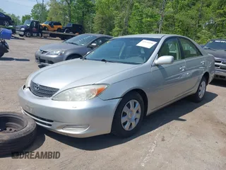 2004 Toyota Camry LE with VIN 4T1BE32K24U817748, listed as a IAAI auction lot 42155150 with 158,437 mi miles and . Bid and sale history available at DreamBid. Image 2.