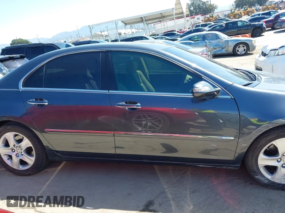 2006 Acura RL z VIN JH4KB16516C004396, wystawiony jako IAAI lot #41959850 z przebiegiem 114 670 mil mil oraz . Historia ofert i sprzedaży dostępna na DreamBid. Obrazek 12.