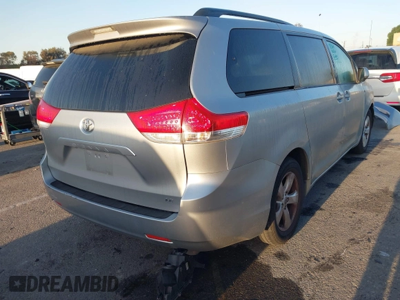 2014 Toyota Sienna LE AAS with VIN 5TDKK3DC1ES520561, listed as a IAAI auction lot 41959565 with 115,908 mi miles and . Bid and sale history available at carsss.com. Image 4.