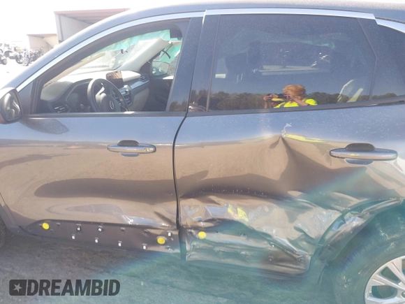 2023 Ford Escape Active with VIN 1FMCU0GZ1PUA35697, listed as a IAAI auction lot 41886290 with 82,824 mi miles and . Bid and sale history available at DreamBid. Image 14.