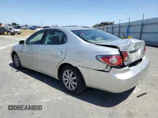 2002 Lexus ES 300 with VIN JTHBF30G420014345, listed as a Copart auction lot 57890135 with 153,695 mi miles and Salvage title. Bid and sale history available at DreamBid. Image 2.
