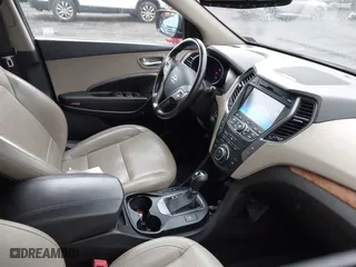 2013 Hyundai Santa Fe Sport with VIN 5XYZUDLBXDG045656, listed as a IAAI auction lot 41836325 with 176,756 mi miles. Bid and sale history available at carsss.com. Image 5.