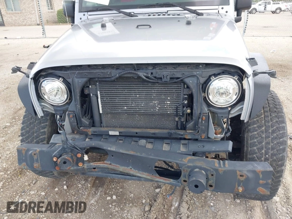 2018 Jeep Wrangler Unlimited Sahara with VIN 1C4BJWEGXJL806832, listed as a IAAI auction lot 42605892 with 90,535 mi miles and . Bid and sale history available at DreamBid. Image 6.