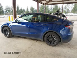 2023 Tesla Model Y Long Range with VIN 7SAYGDEEXPF621397, listed as a IAAI auction lot 41922714 with 29,460 mi miles. Bid and sale history available at carsss.com. Image 14.
