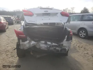 2017 Ford Focus SE with VIN 1FADP3F23HL327032, listed as a Copart auction lot 42398055 with 123,453 mi miles and Salvage Title. Bid and sale history available at carsss.com. Image 6.