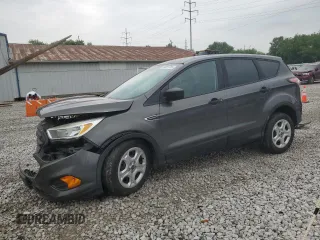 2017 Ford Escape S with VIN 1FMCU0F7XHUA48210, listed as a Copart auction lot 59891765 with 85,406 mi miles and Salvage title. Bid and sale history available at DreamBid. Image 1.