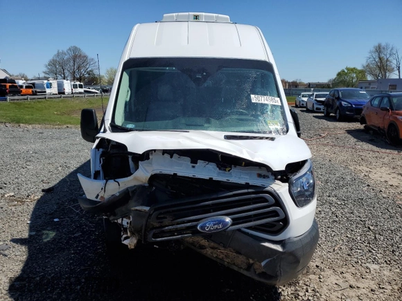 2018 Ford Transit с VIN 1FTBW3XMXJKB40404, выставлен на аукционе Copart как лот 50774585 с пробегом Не указан миль и Списание • Salvage title. История ставок и продаж доступна на DreamBid. Изображение 5.