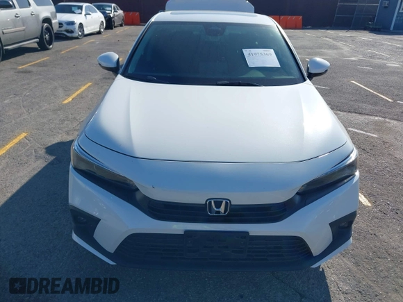 2024 Honda Civic Touring z VIN 2HGFE1F93RH303145, wystawiony jako IAAI lot #41975369 z przebiegiem 32 644 mil mil oraz . Historia ofert i sprzedaży dostępna na DreamBid. Obrazek 12.