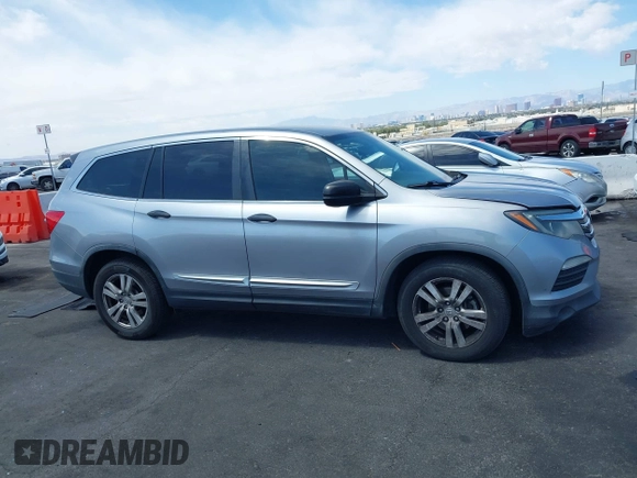 2016 Honda Pilot LX with VIN 5FNYF5H10GB044006, listed as a IAAI auction lot 42075404 with 129,642 mi miles and . Bid and sale history available at DreamBid. Image 13.
