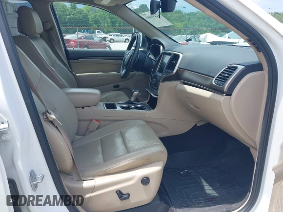 2017 Jeep Grand Cherokee Limited z VIN 1C4RJEBG4HC736087, wystawiony jako IAAI lot #42491605 z przebiegiem 150 465 mil mil oraz . Historia ofert i sprzedaży dostępna na DreamBid. Obrazek 5.