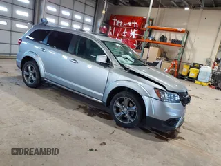2016 Dodge Journey Crossroad Plus z VIN 3C4PDCGB5GT225801, wystawiony jako IAAI lot #41267638 z przebiegiem 130 003 mil mil oraz . Historia ofert i sprzedaży dostępna na DreamBid. Obrazek 1.