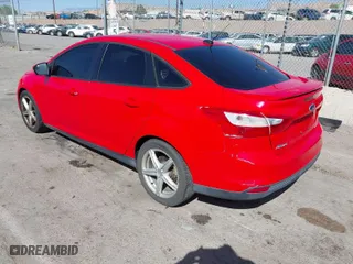 2013 Ford Focus SE with VIN 1FADP3F20DL266037, listed as a IAAI auction lot 42019852 with 160,549 mi miles. Bid and sale history available at carsss.com. Image 3.