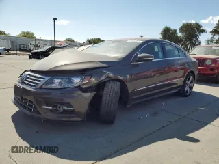 2014 Volkswagen CC R-Line with VIN WVWBP7AN7EE537157, listed as a Copart auction lot 65404654 with 153,336 mi miles and Salvage Title. Bid and sale history available at DreamBid. Image 1.