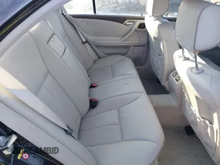2002 Mercedes-Benz E-Class with VIN WDBJF65J32B485019, listed as a IAAI auction lot 41388188 with 119,417 mi miles. Bid and sale history available at carsss.com. Image 8.