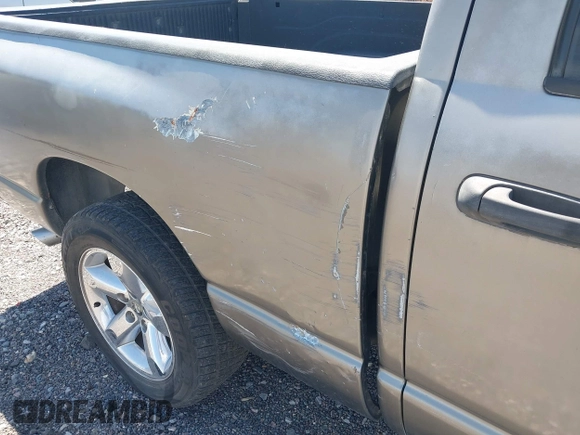 2004 Dodge 1500 SLT with VIN 1D7HA18NX4S723229, listed as a IAAI auction lot 42169829 with 228,812 mi miles. Bid and sale history available at carsss.com. Image 13.