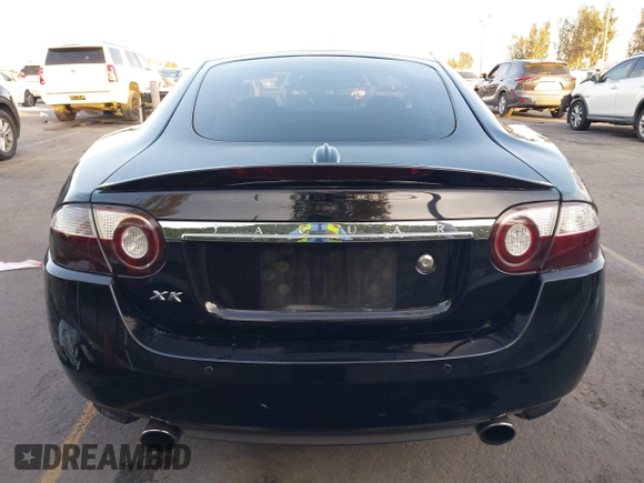 2008 Jaguar XK with VIN SAJWA43B985B23987, listed as a IAAI auction lot 41197091 with 54,803 mi miles. Bid and sale history available at carsss.com. Image 16.