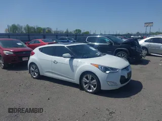 2016 Hyundai Veloster with VIN KMHTC6AD9GU272411, listed as a IAAI auction lot 41904711 with 133,490 mi miles. Bid and sale history available at carsss.com. Image 1.