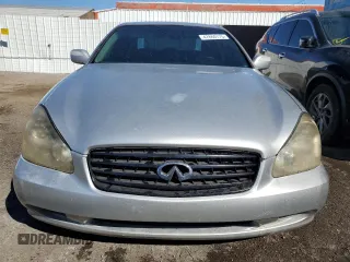 2003 Infiniti Q45 z VIN JNKBF01AX3M103002, wystawiony jako Copart lot #47860175 z przebiegiem 317 912 mil mil oraz Tytuł czysty. Historia ofert i sprzedaży dostępna na DreamBid. Obrazek 5.