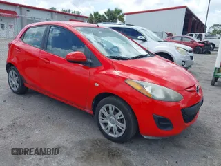2012 Mazda 2 Sport with VIN JM1DE1KZXC0151940, listed as a IAAI auction lot 41949336 with 92,923 mi miles. Bid and sale history available at carsss.com. Image 1.